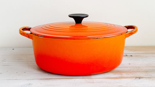 Shiny flame orange Le Creuset oval enamelware Dutch oven looks great after cleaning