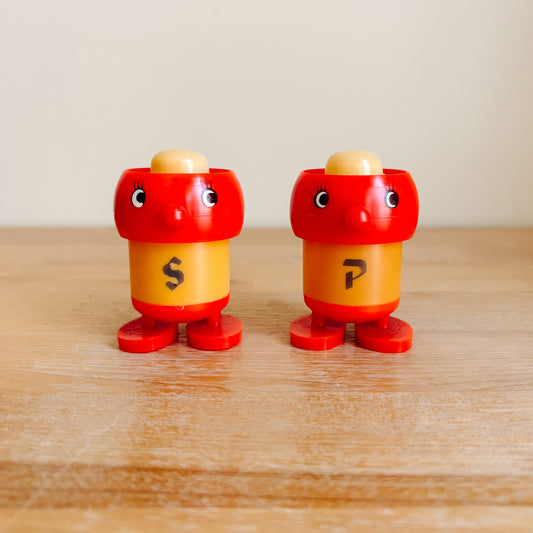 Salt & Pepper Shakers - Red & Yellow Plastic Figurines